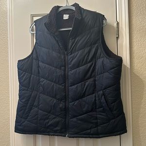 black puffer vest with pockets.
